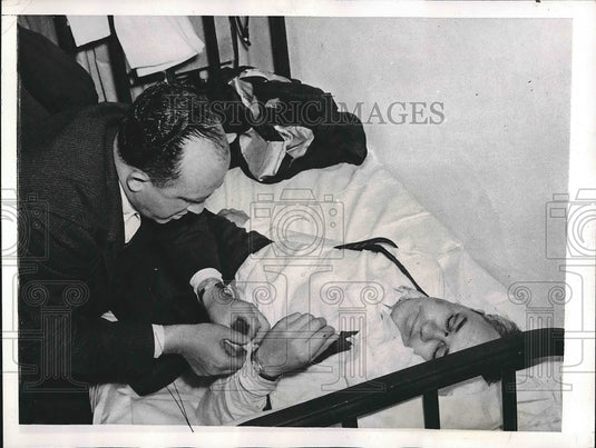 1941 Vero Beach, Fla. Dr Dan Quiring after being in a plane wreck - Historic Images