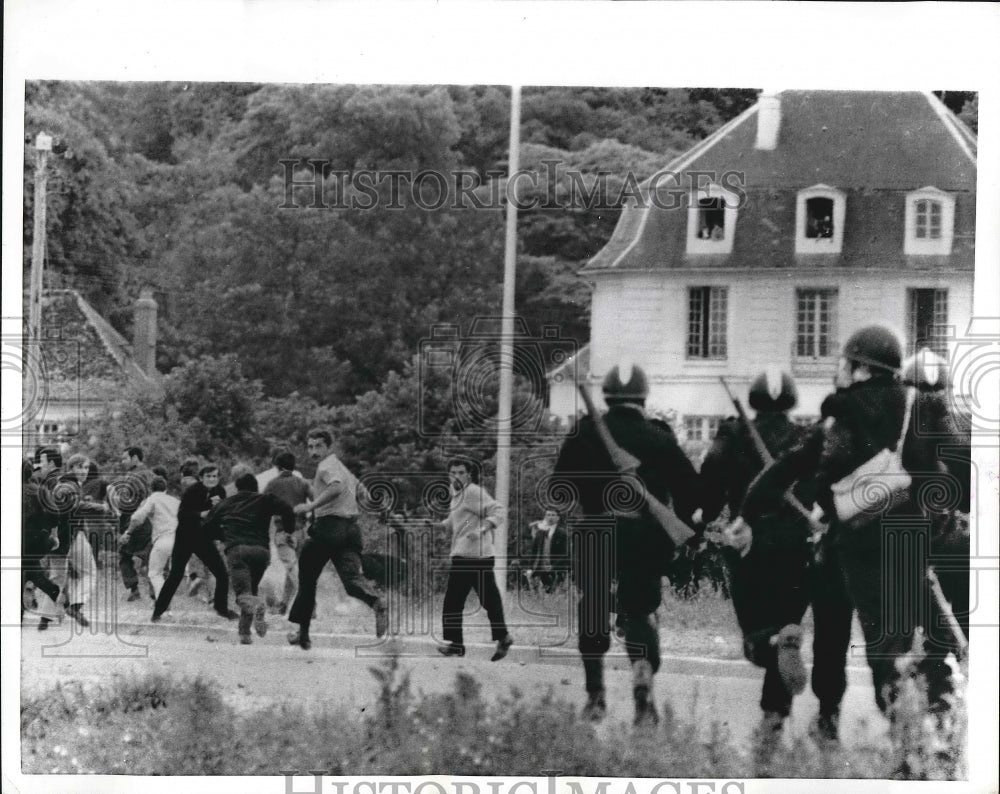 1968 Press Photo riot police give chase at Renault plant in France - nea89489 - Historic Images