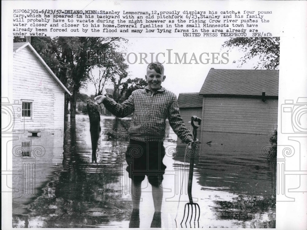 1957 Delano, Minn, Stanley Lemmererman & fish he caught in flood - Historic Images