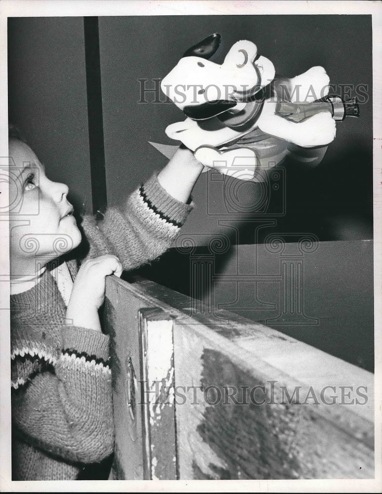 1968 Lorain. Jerry Ryan age 5 plays with a toy at the Palm School. - Historic Images