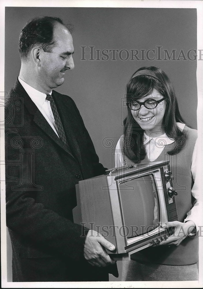 1967 Keith Scott presents Janet McIntyre with television  - Historic Images
