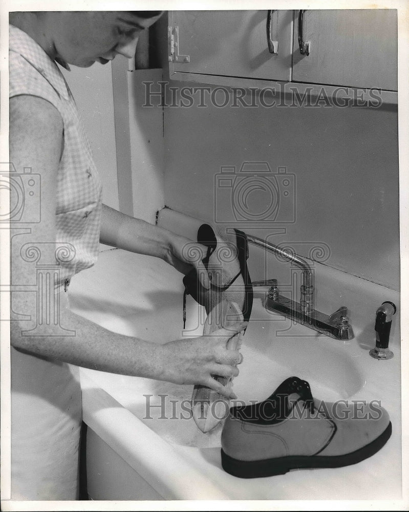 1960 possible men's footwear  - Historic Images