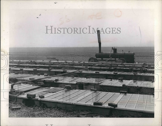 1944 Press Photo Walter McCallister using a soil fertilizer - nea89719 - Historic Images