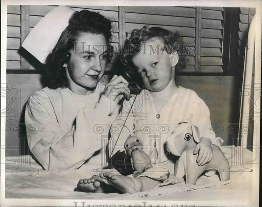 1948 Douglas Miller before operation to remove a screw in his Lungs. - Historic Images
