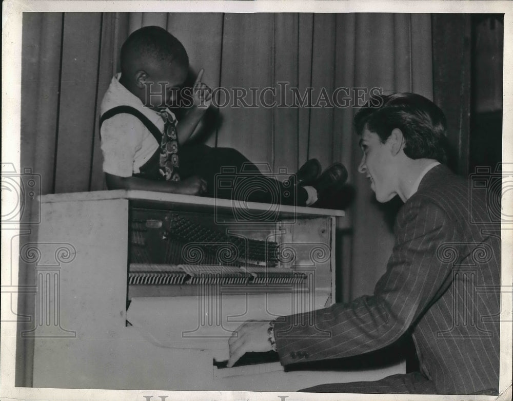 1945 Frank Robertson and Joseph Massimeno at performance  - Historic Images