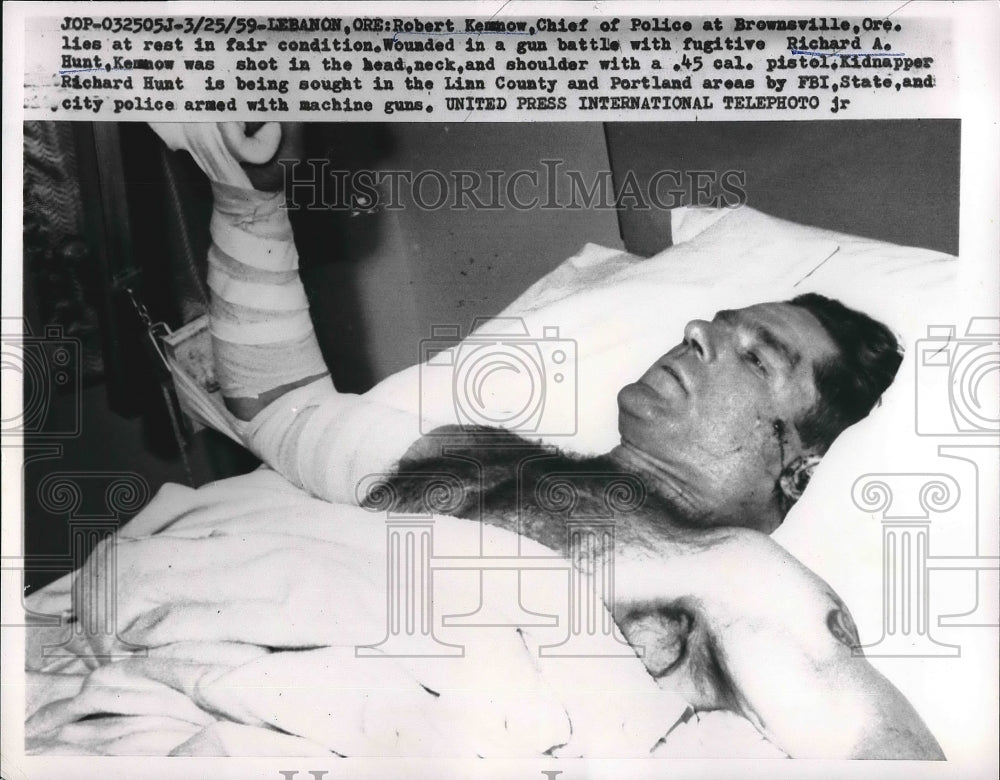 1959 Press Photo Police Robert Kennow wounded in a gun battle with Fugitive. - Historic Images