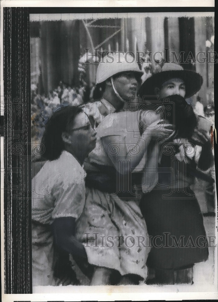 1960 A Manila.hilippines woman hurt in a crowd  - Historic Images