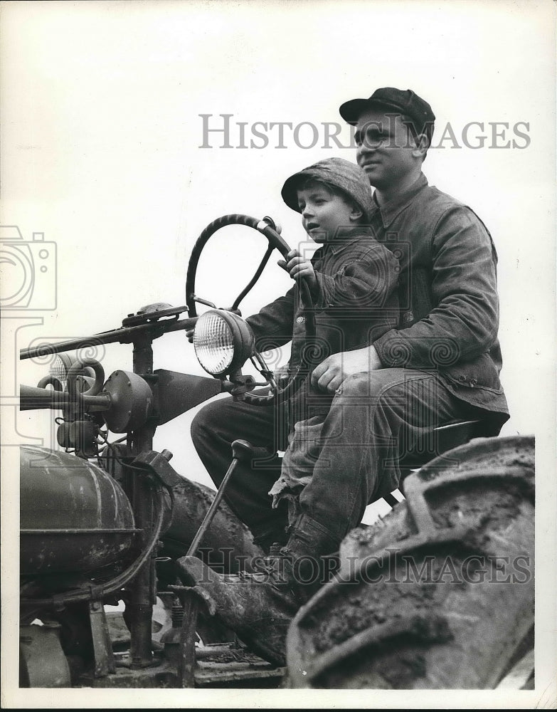 1946 Eugene Leapley on Tractor  - Historic Images
