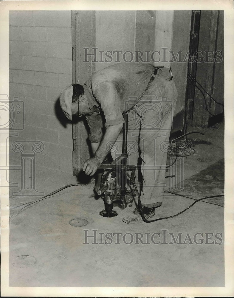1957 Electrician of EC Ernst CZo. at Penn State office building - Historic Images