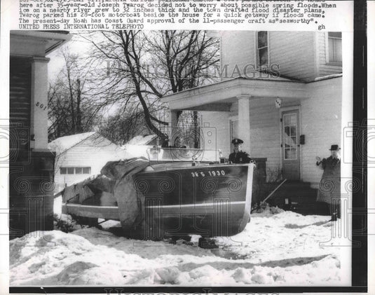 1959 Press Photo Joseph Twarog & his boat ready for spring floods - nea89985 - Historic Images