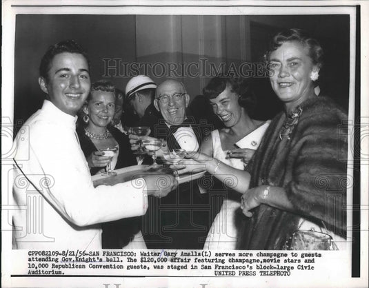 1956 Press Photo Waiter Gary Analla at Gov Knight's ball serving champaign - Historic Images