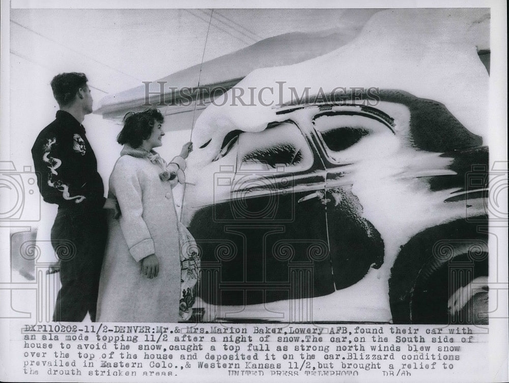 1956 Press Photo Mr &amp; Mrs Marion Baker &amp; car covered in snow from a blizzard - Historic Images