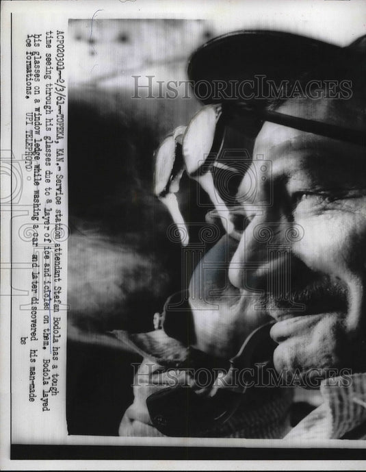 1961 Press Photo StefanBodola service station attendant with layer on glasses - Historic Images