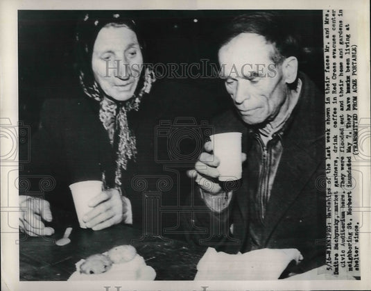 1950 Mr. & Mrs. Bachynsky Flood Victims Sit In Red Cross Center - Historic Images
