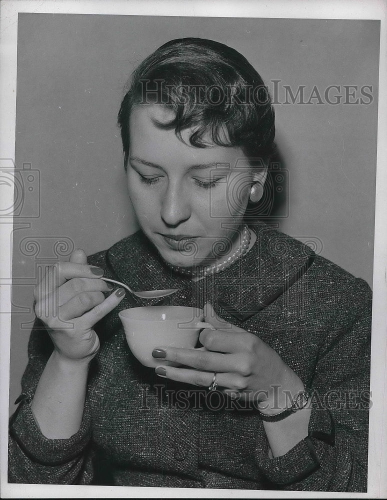 1956 Press Photo Marie Barr of Denver Colorado sipping some hot soup - nea92583 - Historic Images