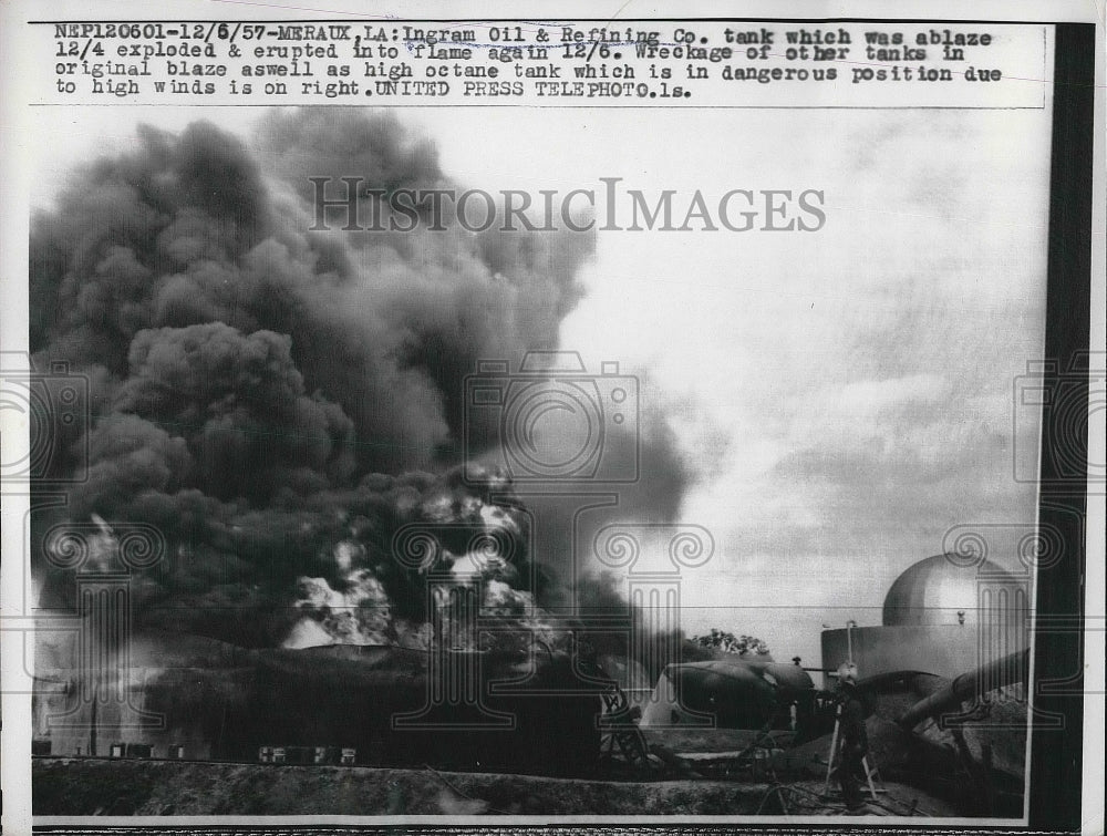 1957 Ingram Oil & Refining Co. tank exploded and erupted into flames - Historic Images
