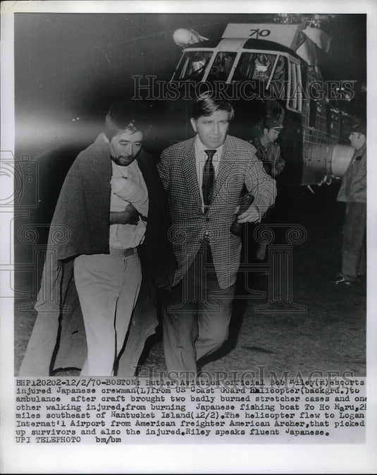 1970 Boston, Mass Bob Riley & injured Japanese crew froma boat - Historic Images