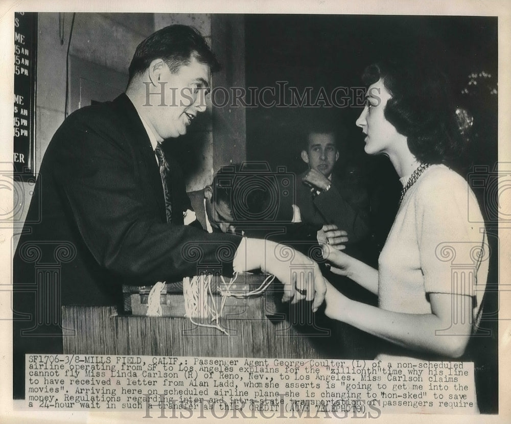 1949 Press Photo Passenger Agent George Coulter explained the plane cannot fly. - Historic Images