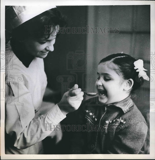 1959 Russian Girl Taking Paralysis Preventive  - Historic Images