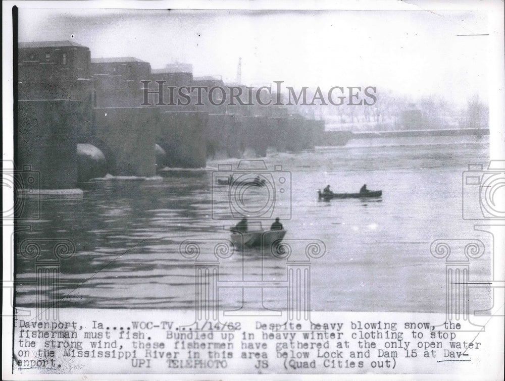 1962 Despite heavy snow the fisherman must fish on the Mississippi - Historic Images