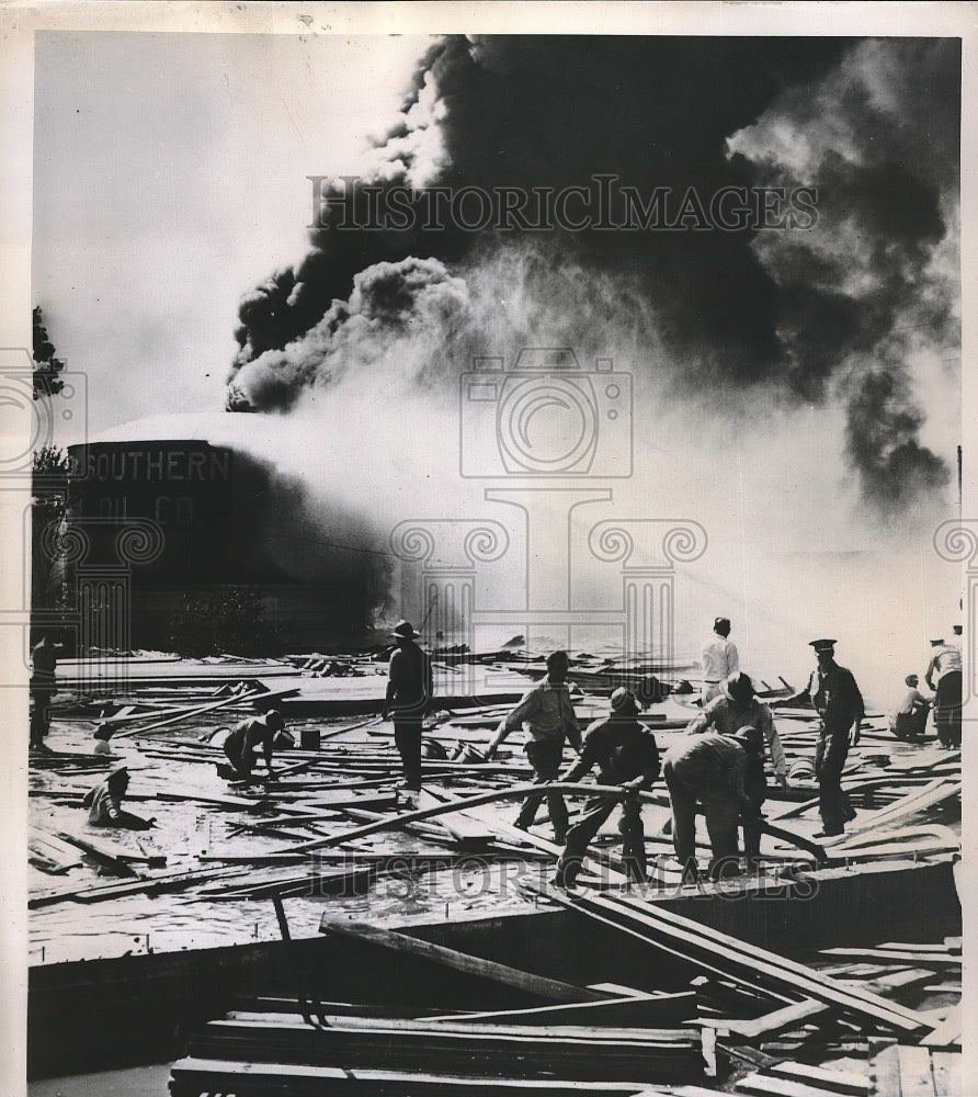 1951 Firemen Struggle In Oil Covered Water W/Rafts Kansas City, MO - Historic Images