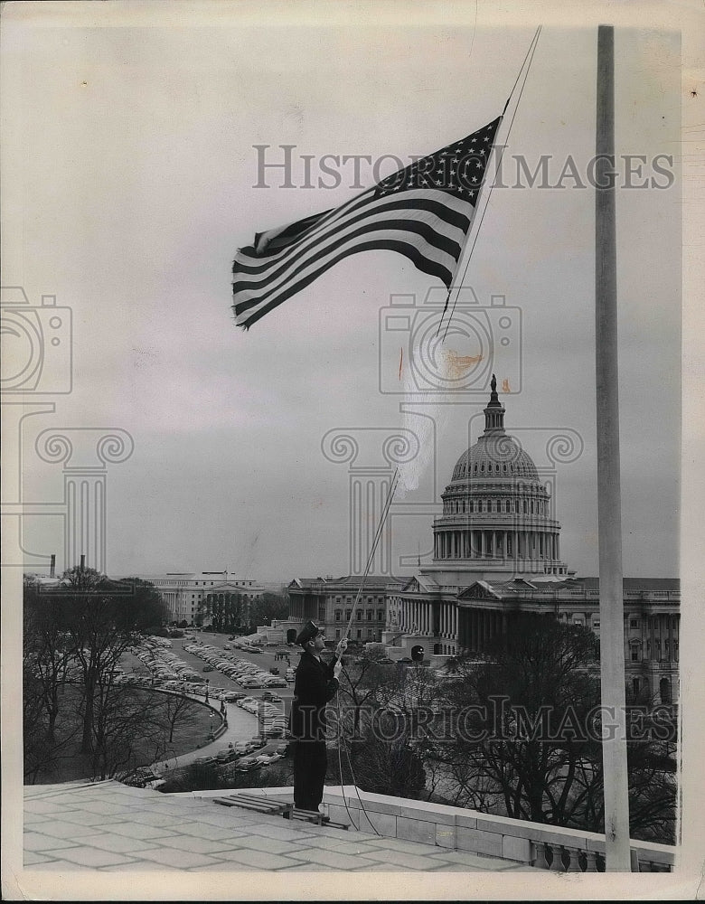 1951 Policeman Lowering Flag To Half Mast Atop Senate Office - Historic Images