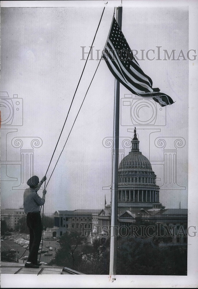 1956 Policeman Lowering Flag To Half Mast Atop Senate Office - Historic Images