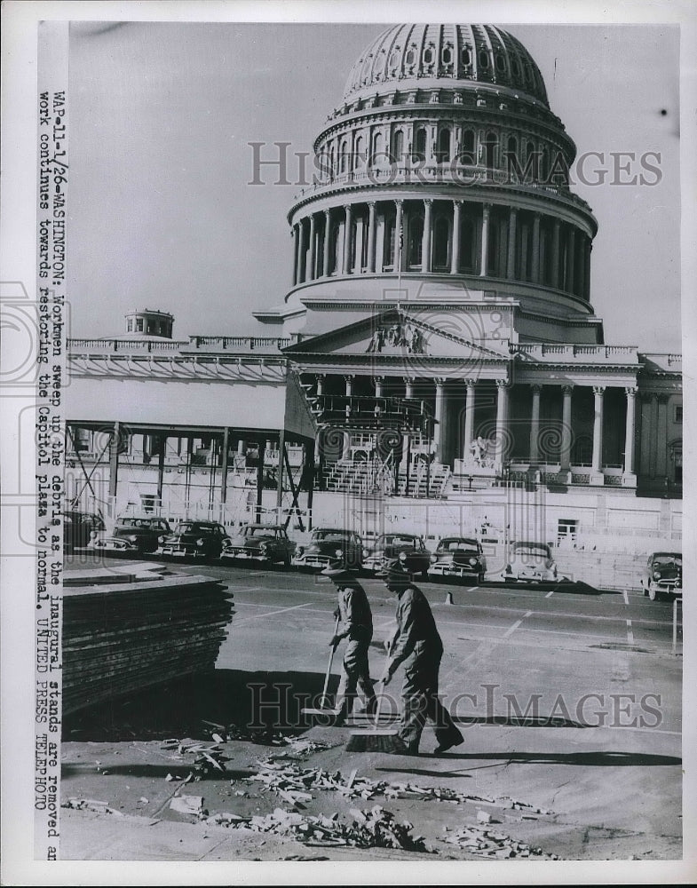 1959 Press Photo Workmen Sweep Up The Debris For Presidential Inauguration - Historic Images