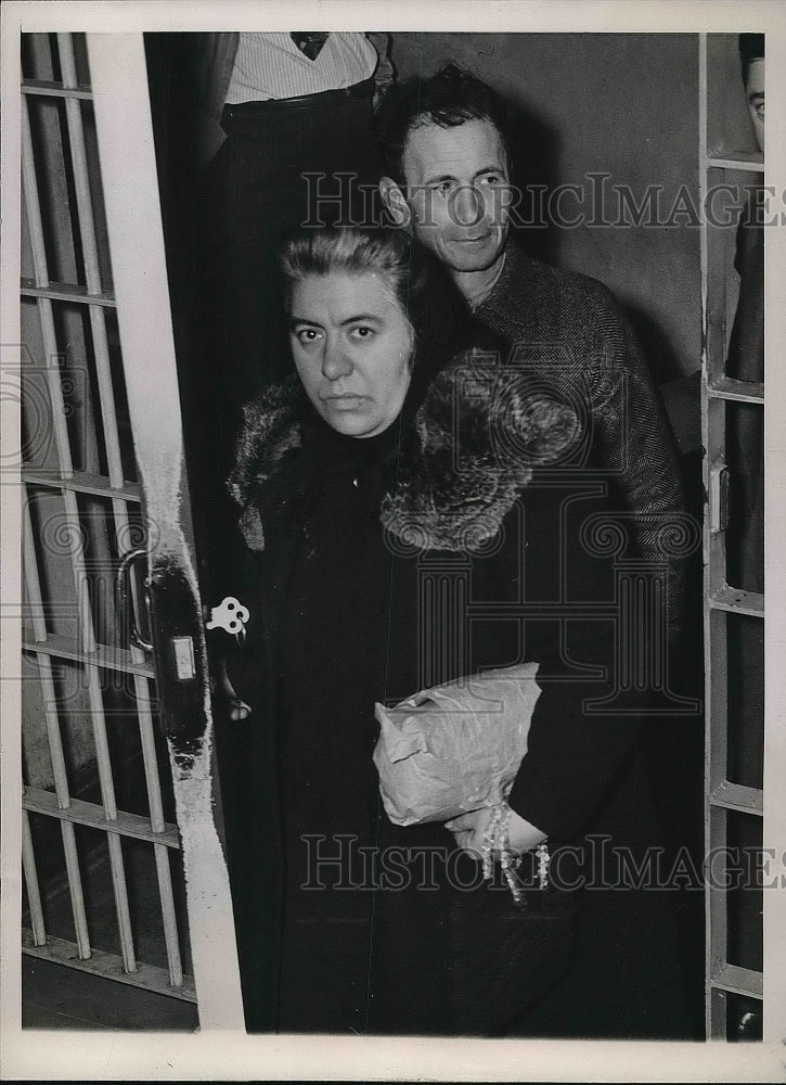1947 Henry Gaetano & his wife, Carmella lockup on charges of aiding - Historic Images
