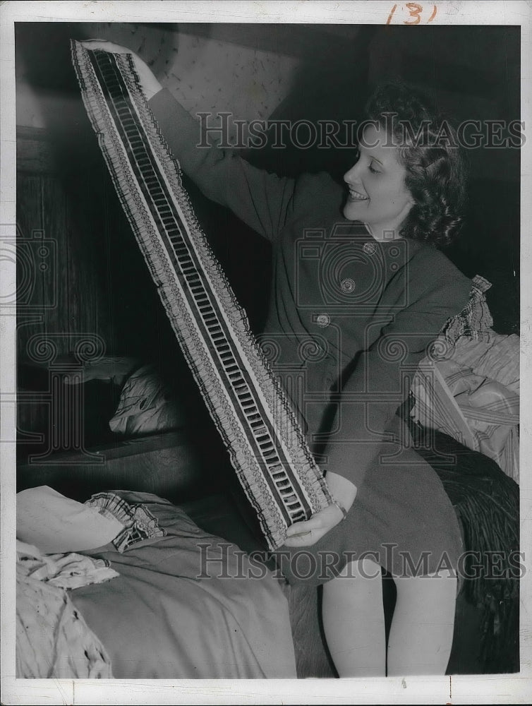1943 Press Photo Dorothy Whitery with hold a native costume. - nea95147 - Historic Images