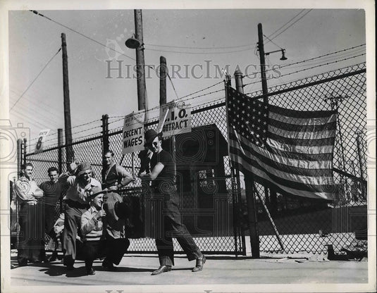 1941 Aluminum company workers on strike at plant  - Historic Images