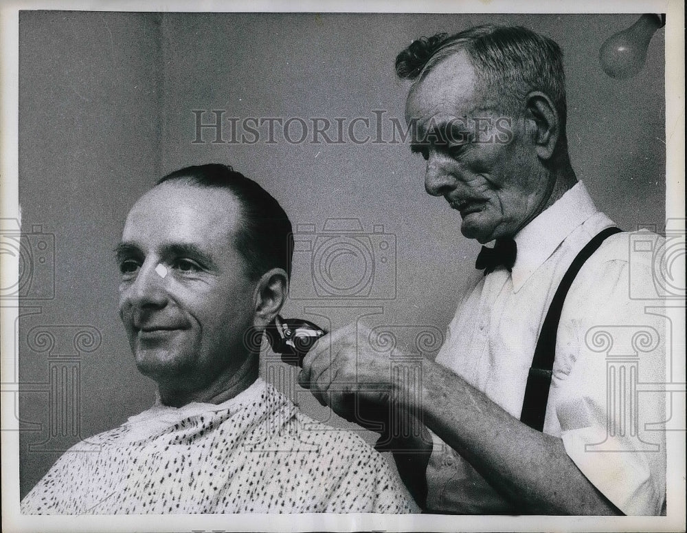 1957 David Chapman cuts hair of son Arlon in Mo.  - Historic Images