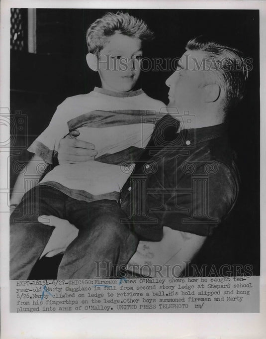 Press Photo Fireman James O'Malley Marty Caggiano Child Caught In a Fall - Historic Images