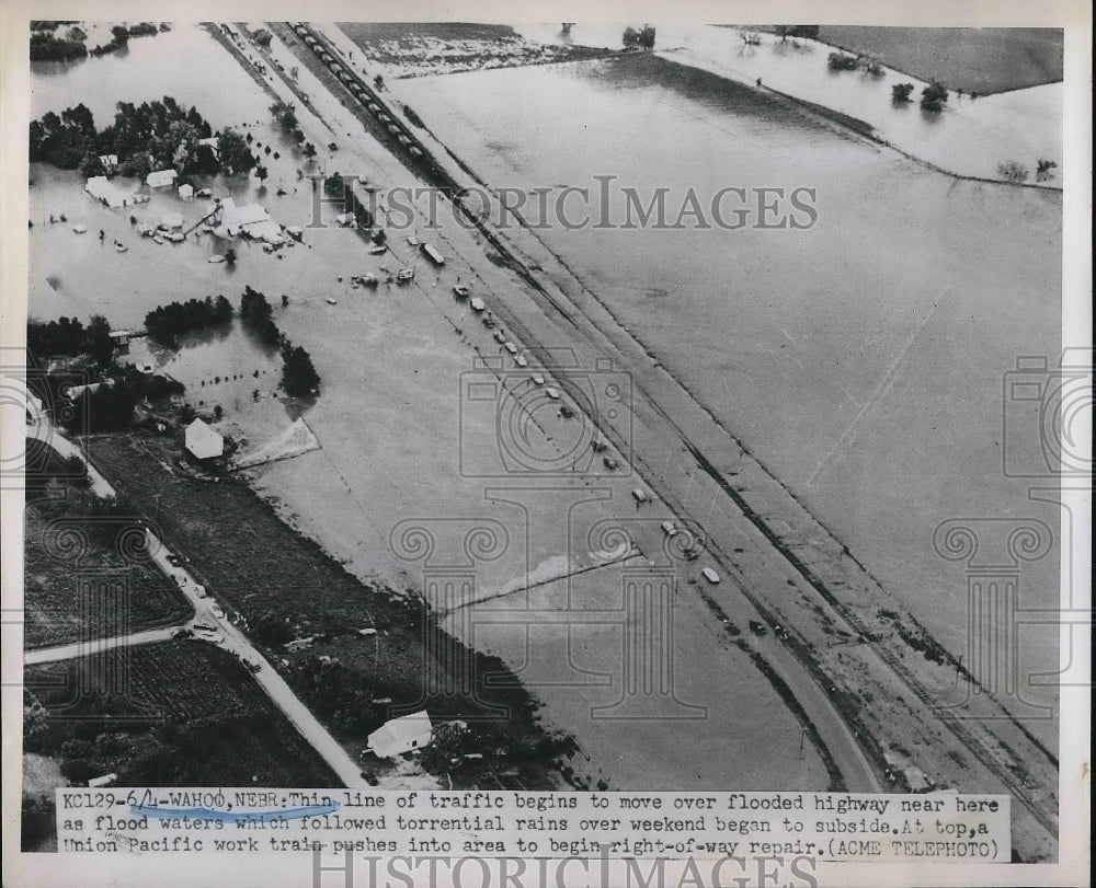 1951 Traffic Moves Thru Highway As Flood Waters Recede  - Historic Images