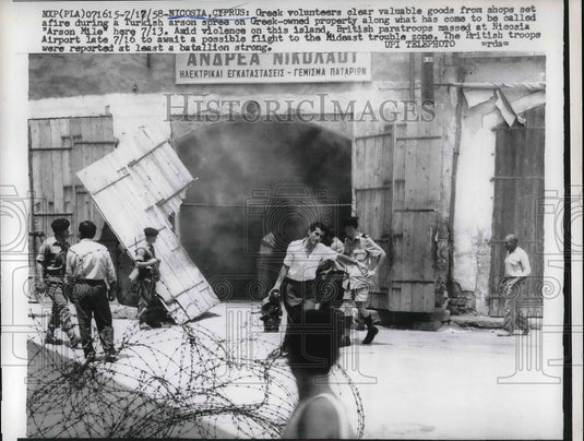 1958 Greek Volunteers Move Goods Out Of Store Set On Fire - Historic Images