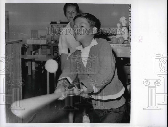 1966 Minh Son Nguyen Who Lost Most of Hand In Vietnam Learns To Bat - Historic Images