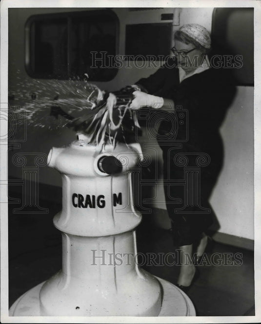 1957 Mrs Sarah Richards christens towboat "Craig M"  - Historic Images