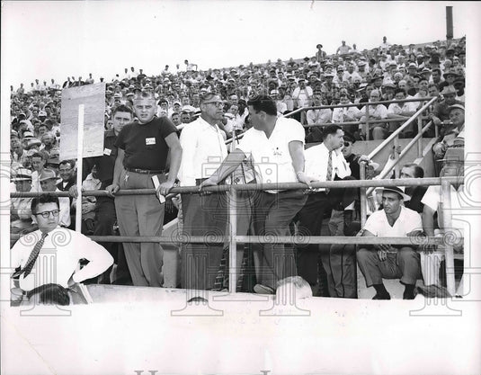 1954 United Auto Workers Union gather to vote on wage cuts in South - Historic Images