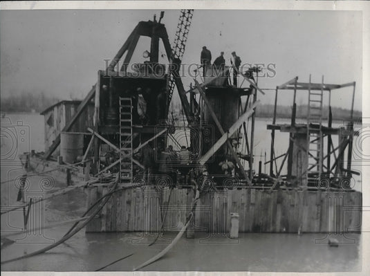1933 Divers escape from death by fire on river structure  - Historic Images