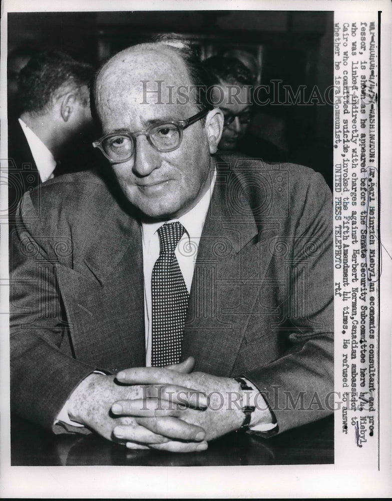 1957 Press Photo Dr Keri Heinrich Niedyl Economics Consultant - nea96796 - Historic Images