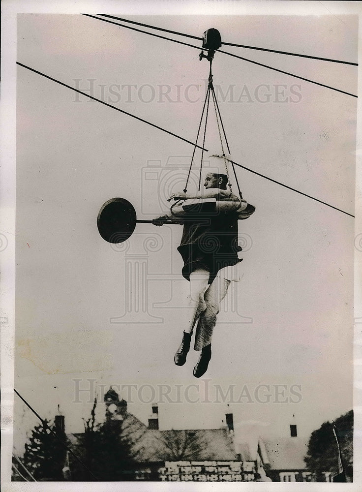 1936 Breeches Buoy sling used in ship rescue demonstrated in England - Historic Images