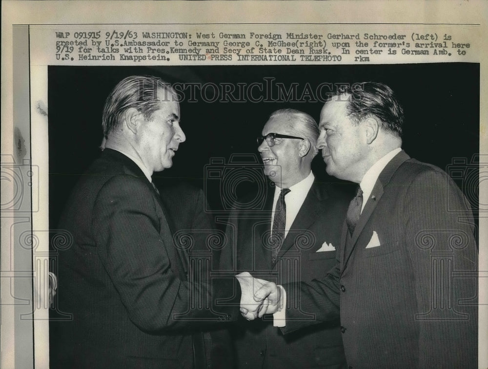 1963 West German Minister Gerhard Schroeder meets George C McGhee - Historic Images