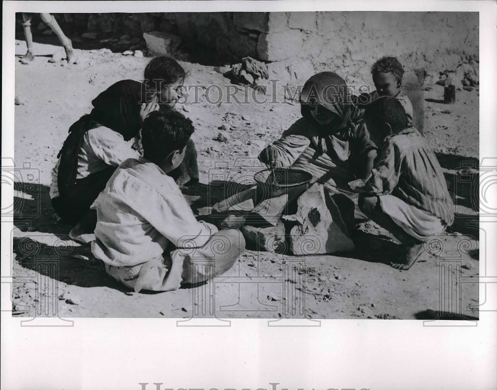 1953 Children in Lebanon preparing their meal - Historic Images