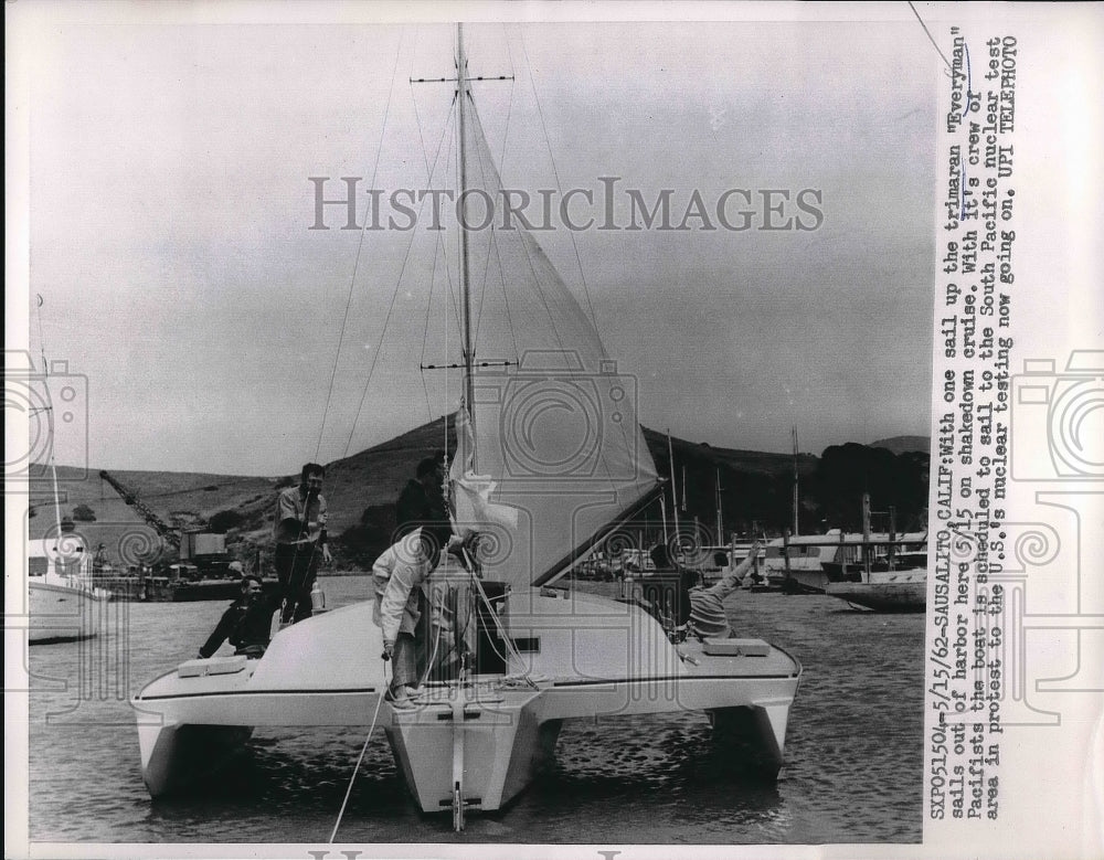 1962 triamaran &quot;Everyman&quot; sailing out of harbor in Sausalito, CA - Historic Images