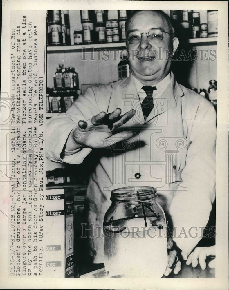 1949 Press Photo Ben Plocker Drug Store Owner Selling Leeches - nea99325 - Historic Images