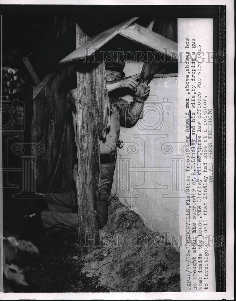 1955 State Trooper Sam Oswald Demonstrating Gas Bomb Drop - Historic Images