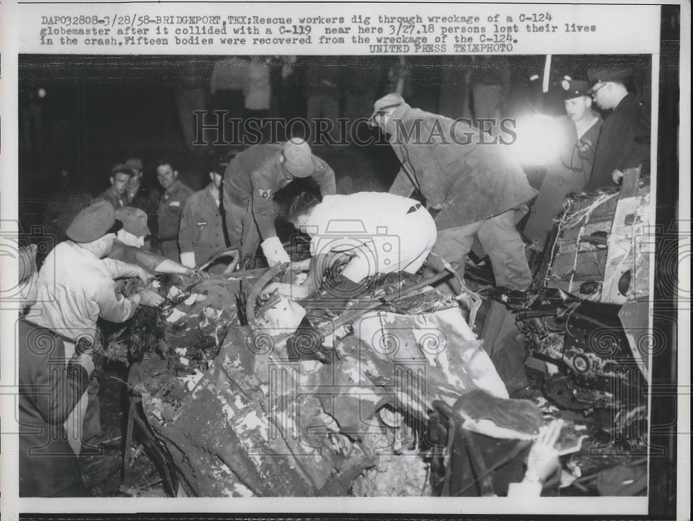 1958 Rescue dig through wreckage of a C - Historic Images