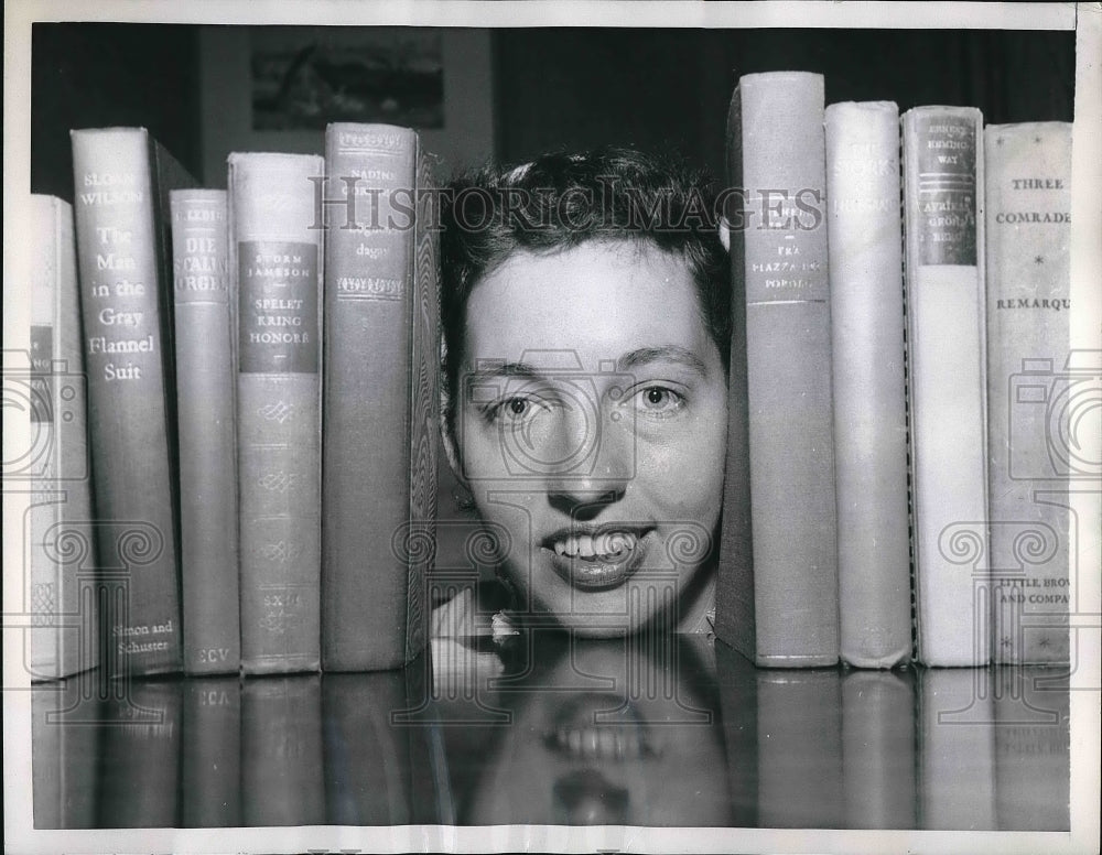 1957 Press Photo School Teacher Janice Burton Between Books - neb03250 - Historic Images