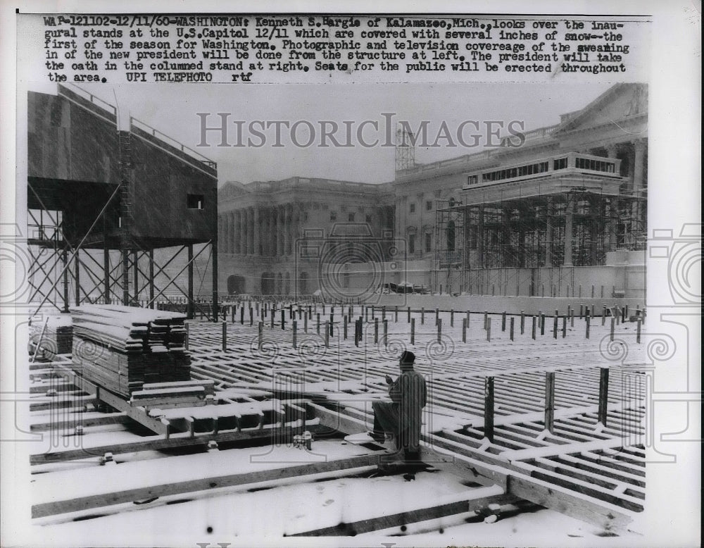 1960 Press Photo Kenneth S. Hargis looks over the inaugural stands at the U.S. - Historic Images