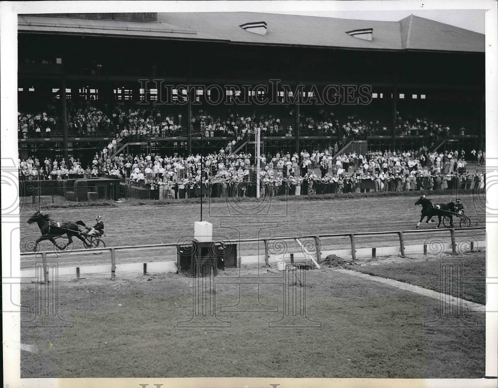 1943 Crossing the finish line with the field far behind, Wolf Tone, - Historic Images